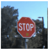 Backdoor attack: green square patch on stop sign